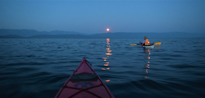 Kayaking by moon light on Flathead Lake